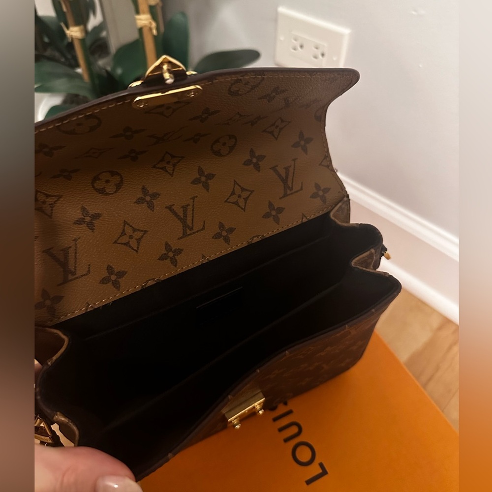 Louis Vuitton Pochette Metis in Reverse Monogram